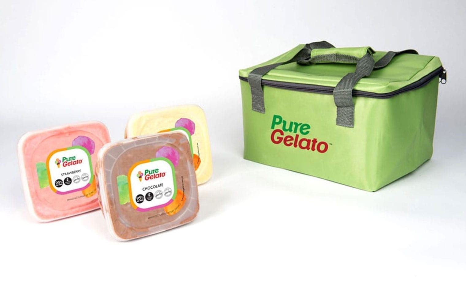 Three containers of Pure Gelato in assorted flavors are displayed next to a green insulated bag branded with the Pure Gelato logo.