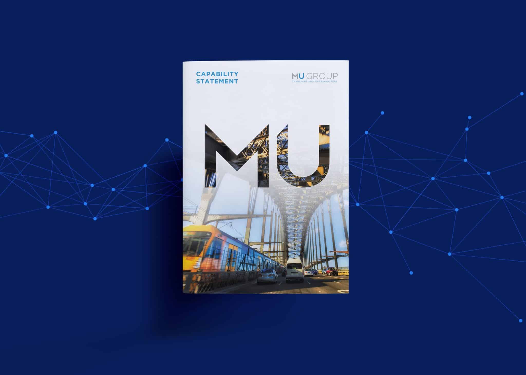 A booklet titled "CAPABILITY STATEMENT" with the letters "MU Group" overlaid on an image of a bridge and a train, set against a blue background with connecting nodes.