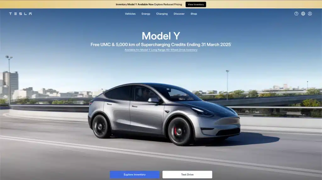 A silver car labeled 'Model Y' glides along a highway, set against a stunning city skyline. This image not only boosts brand awareness but also highlights the limited-time offer of free supercharging credits, ending March 31, 2025.