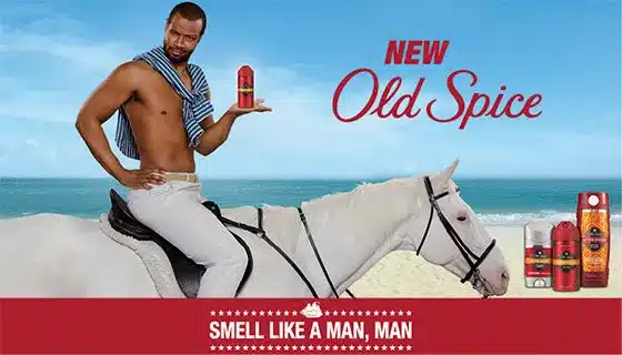 Man on a white horse holds Old Spice deodorant against a beach backdrop. Text reads: "New Old Spice. Smell like a man, man." With its strong brand identity, our deodorant ensures you stand out. Deodorant products displayed at the bottom.
