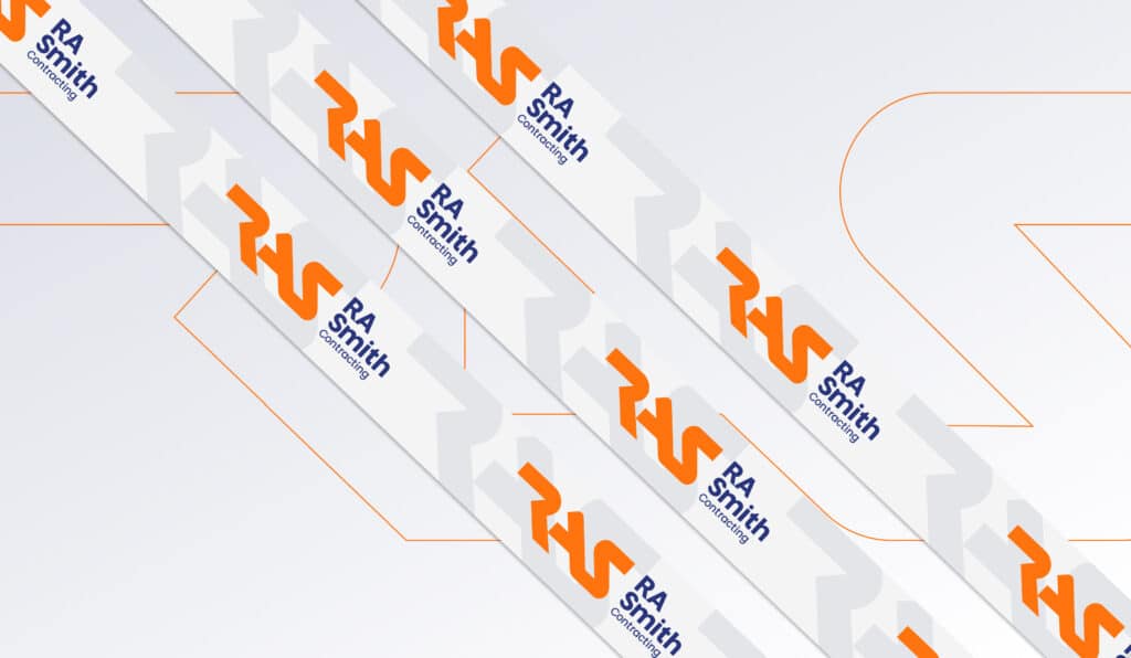 Diagonal bands with orange "RAS" lettering and blue "RA Smith" logos alternate on a light background featuring faint geometric patterns and orange outlines, reflecting RA Smith’s brand transformation and future-ready identity.