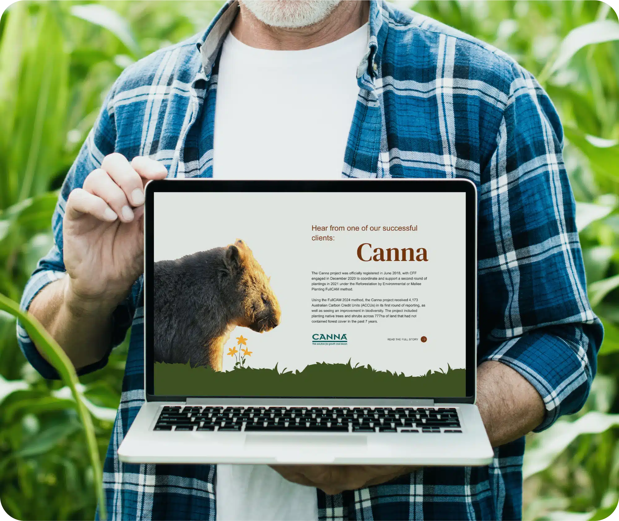 A person in a plaid shirt holds a laptop displaying a testimonial for Canna, featuring an image of a bear and text about a successful client experience.