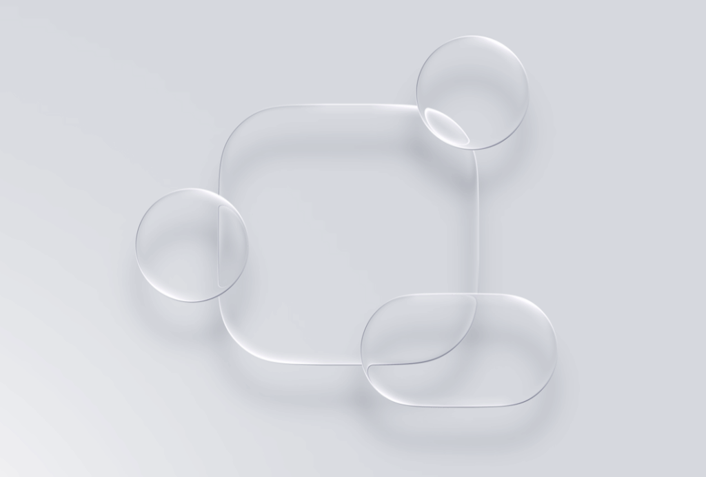Translucent, overlapping geometric shapes—a rounded square and three ovals—evoke liquid glass in a minimalist, abstract digital design on a light gray background.