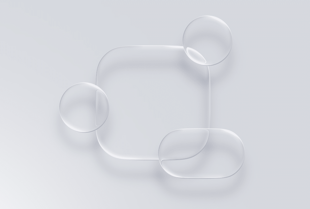 Translucent, overlapping geometric shapes—a rounded square and three ovals—evoke liquid glass in a minimalist, abstract digital design on a light gray background.