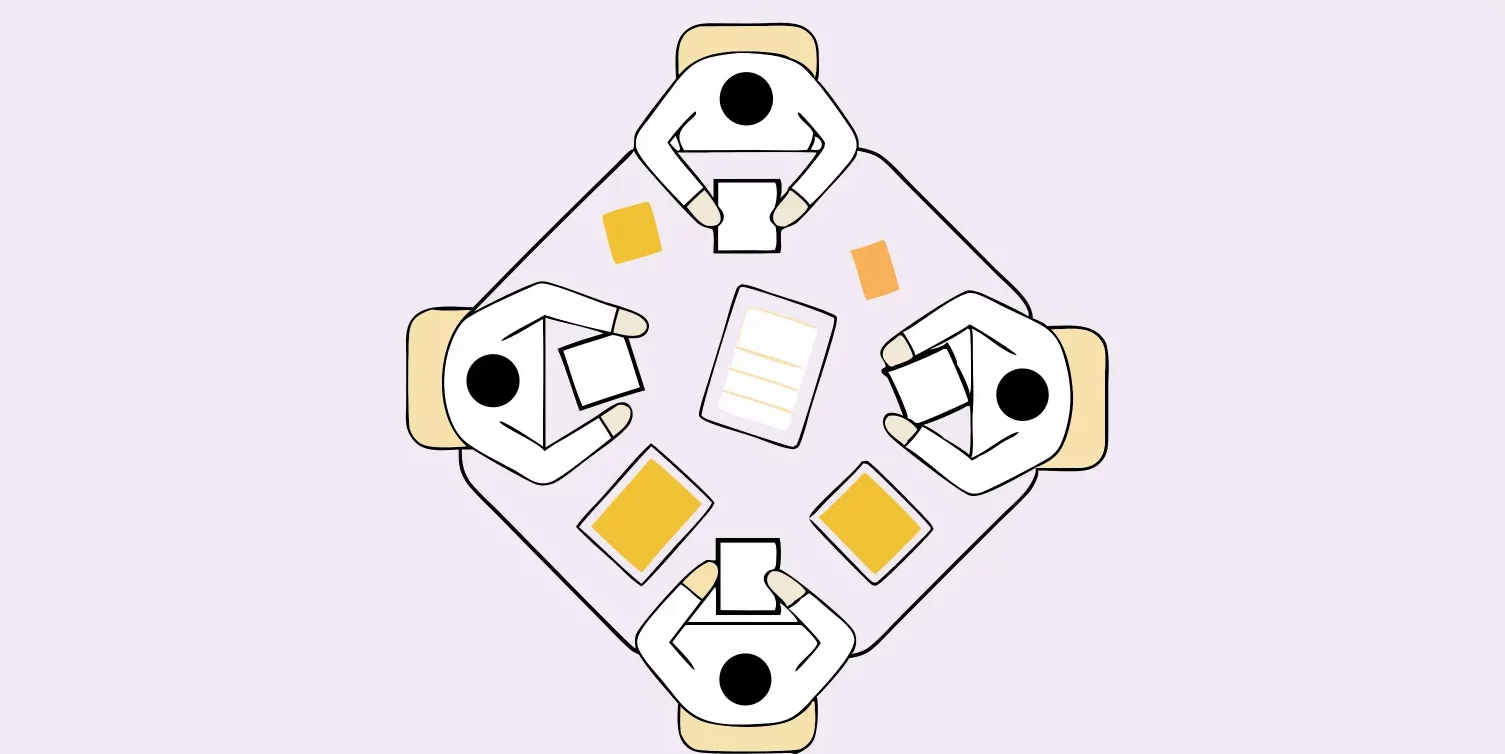 Four abstract figures sit around a square table with documents and devices, viewed from above—perfect inspiration for an SEO content strategy or brainstorming session on AI optimisation.