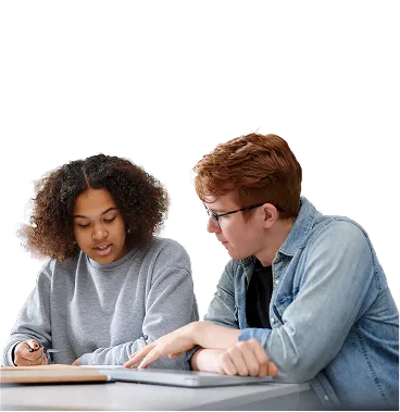 Two people sit at a table, looking at a notebook together and discussing its contents—perfect teamwork for planning a 2025 Home Page update.