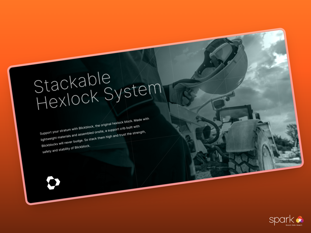 A promotional display for the Stackable Hexlock System features a person stacking BlickBlock units near heavy machinery, with text highlighting mining innovation. The Spark logo appears in the bottom right corner.