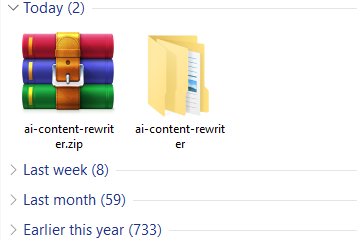 File Explorer window showing two items: a ZIP archive named "ai-content-rewriter.zip" with a WinRAR icon and a folder named "ai-content-rewriter" for the Chrome Extension, ready for Installation Instruction.