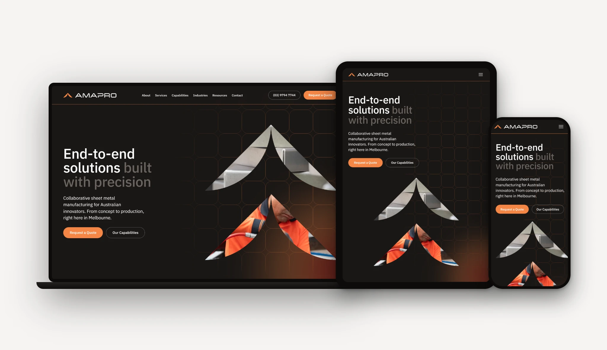 A responsive website for Amapro, a precision manufacturer, is displayed on a laptop, tablet, and smartphone—all showing the homepage with the text "End-to-end solutions built with precision," highlighting an elevated brand experience across every device.