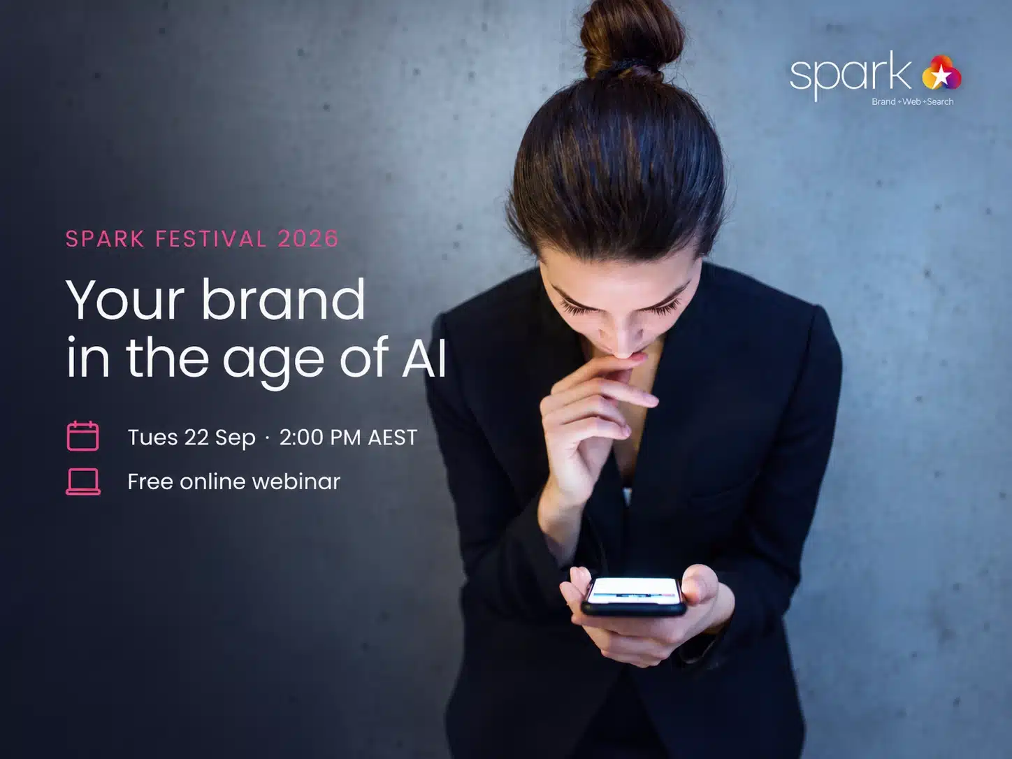 Woman in a suit looks at her phone; text promotes a free online webinar titled “Your brand in the age of AI” at Spark Festival 2026 on September 22 at 2:00 PM AEST, perfect for anyone interested in how AI is shaping the future of business.